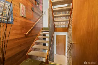T&G wood on the walls of the entry add character to this beautiful home.