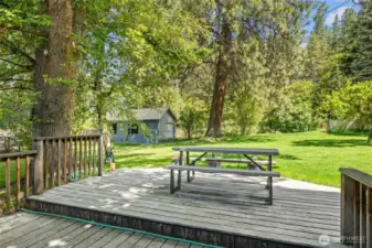 Deck space in the backyard offers a level spot for dining during the summer months.