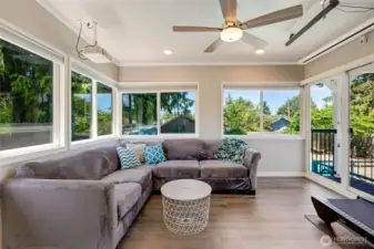 Main Floor - Media Room overlooking the pool and outside entertainment areas. Remote drop down 100'' screen included!!