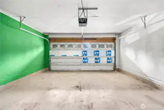 Large garage with space for storage or tools