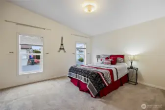 Primary bedroom has lots of light
