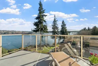 New deck with glass railing.