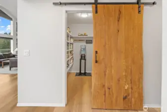 The sliding door to the pantry was handcrafted by a local artisian.