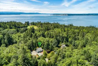 Aerial view of property with coastline. Maxwelton beach is minutes away. The pin drop marks the home.