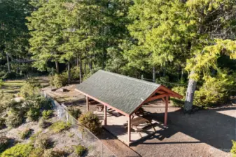 Covered BBQ picnic area. Several firepits.