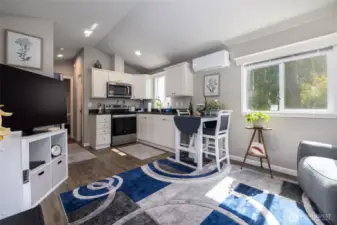 Tiny home is has it all even a washer and dryer.