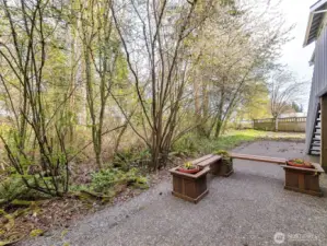 Patio below the upper deck - good for getting fresh air or for above-ground gardening.