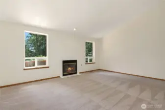 Living room is light, bright and roomy.