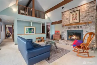 Primary suite is down the hall on the left. Note the loft space & tons of storage!