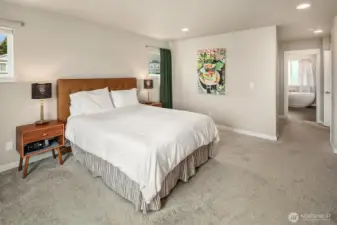 Primary with en suite bath and walk-in closet.