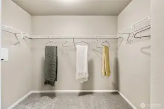 Primary Walk-In Closet-  Photos are from the Finley model home in prior community. Finishes, upgrades, and features will vary