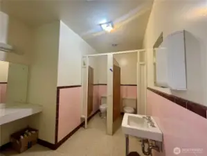 Community bathroom with 2 stalls.