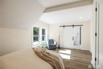 Large Primary Bedroom upstairs with two closets. New barn door to primary bathroom.