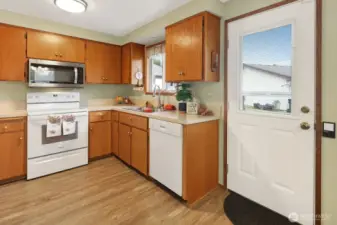 In the kitchen & dining room, you'll appreciate the laminate floors for easy maintenance.