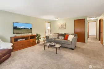 The entry hall includes a coat closet.