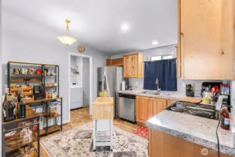 Kitchen with plenty of cabinet space, and room for an island.