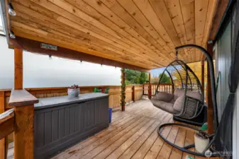 The perfect covered patio for drinking coffee in the morning or hanging out with friends.