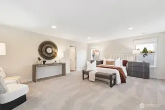 King-sized primary with sitting area