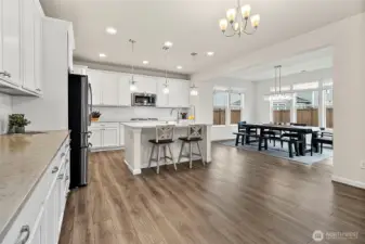 Oversized island offers extra seating and prep space.