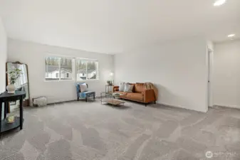 Bonus room upstairs for media, play, office, or workout space.