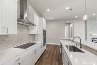 Photos are of another Harris plan- finishes will vary.