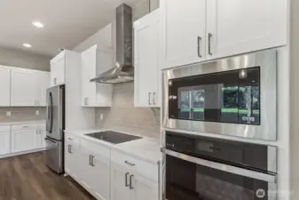 Photos are of another Harris plan- finishes will vary.