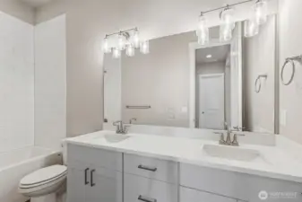 Photos are of another Harris plan- finishes will vary.