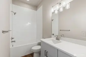 Photos are of another Harris plan- finishes will vary.