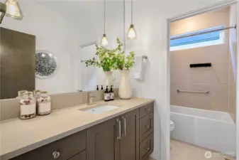2nd floor guest bathrooom with tub and shower