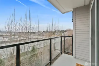 Porch w/ stunning views and additional storage. Don't miss the garage w/ EV charging.