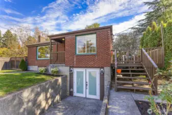 Privacy with large rear yard and two main floors both with fireplaces