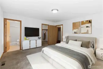 Virtually staged primary suite.