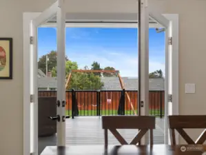 Great Room opens to Dining, Kitchen & French Doors to Deck.