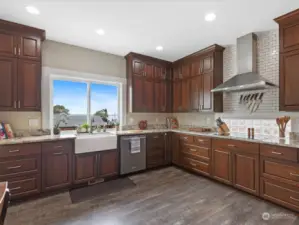 Beautiful open Kitchen is spacious - with stainless appliances, lots of counter space & easy-glide cabinets.