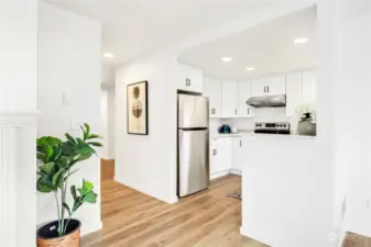 This fully-remodeled kitchen features beautiful Quartz counters, new cabinets, and new appliances.