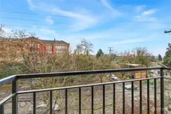 Enjoy territorial and downtown views from the living room balcony.