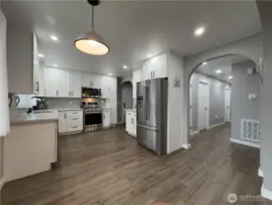 Bright open kitchen with quartz counters