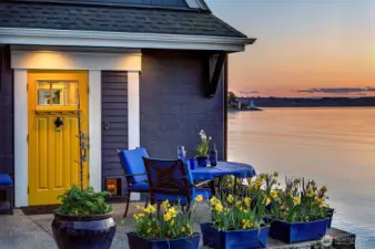 As twilight settles over Caledonia Cove and the iconic Browns Point Lighthouse begins its nightly watch, the yellow door closes softly behind you—leaving a memory steeped in salt air, sea glass, and the gentle rhythm of the tide.