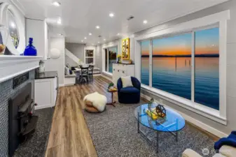 At golden hour, the living room becomes a private cinema—framing a moving masterpiece of sea, sky, and silhouette. Whether curled up fireside or sharing a meal in the dining nook, you’re always immersed in the rhythm of the Sound.