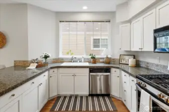 Chef's kitchen with lots of countertop space great for entertaining, daily meal prep and more!
