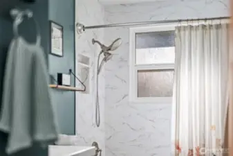 Beautifully tiled shower/bath