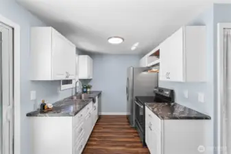 Updated kitchen with new sink and appliances.