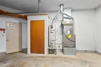 Gas furnace and water heater - 220 power outlet located here for car charging or... power tools