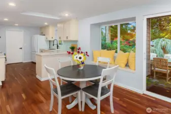 Dining area with Bench and perfect space for indoor/outdoor entertaining!