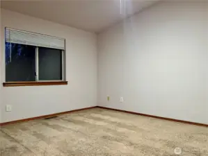 Primary room upstairs with bath.