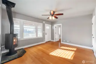 Living room is warmed by a wood-burning Morso stove on chilly nights.