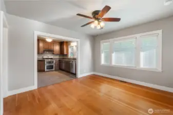 Nice sized dining room with bright windows.