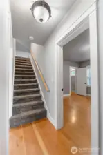 Stairway to upper bedroom and bonus room.