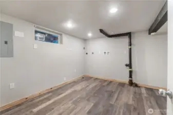 Large utility room also provides space for storage/craft area, etc.