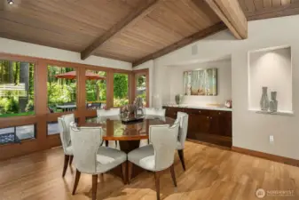Formal dining area with a quartz buffet and lighted art niche
